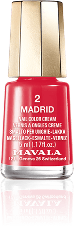 Madrid — A flamy and vivid red, proud like the impressive building at Plaza Mayor
